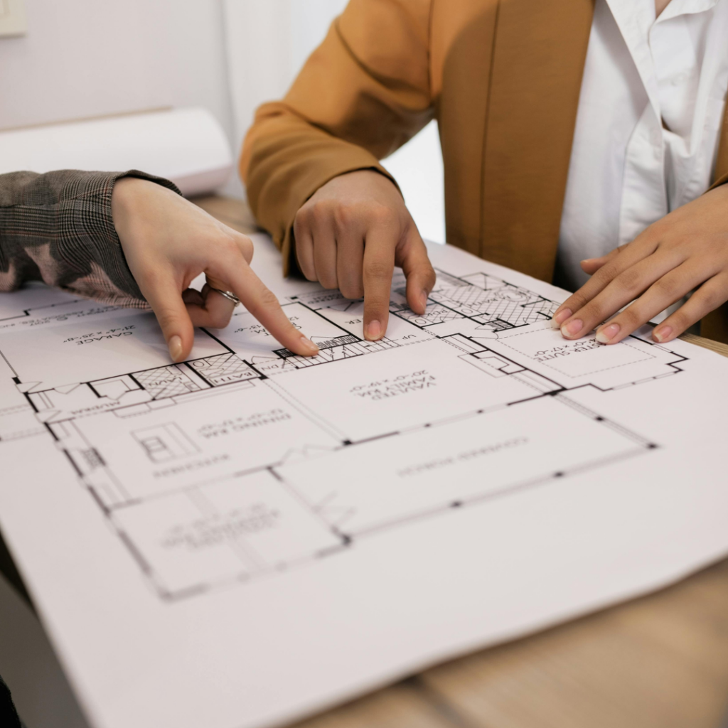 Homebuilders reviewing custom home blueprints in Nashville, TN.